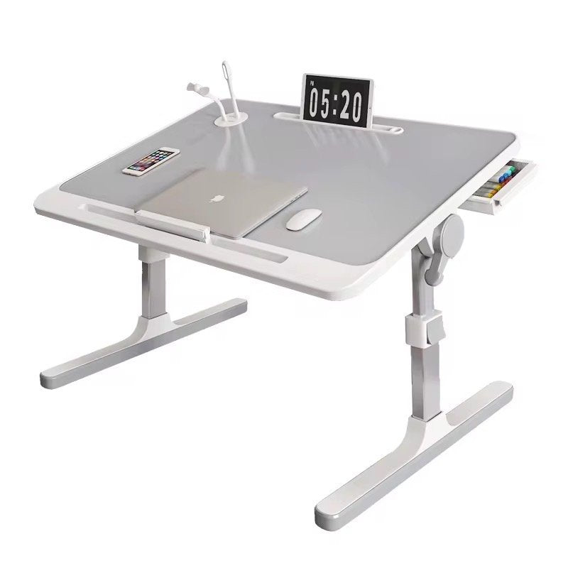 Mesa para laptop con altura ajustable para cama, diseño estable y ergonómico.