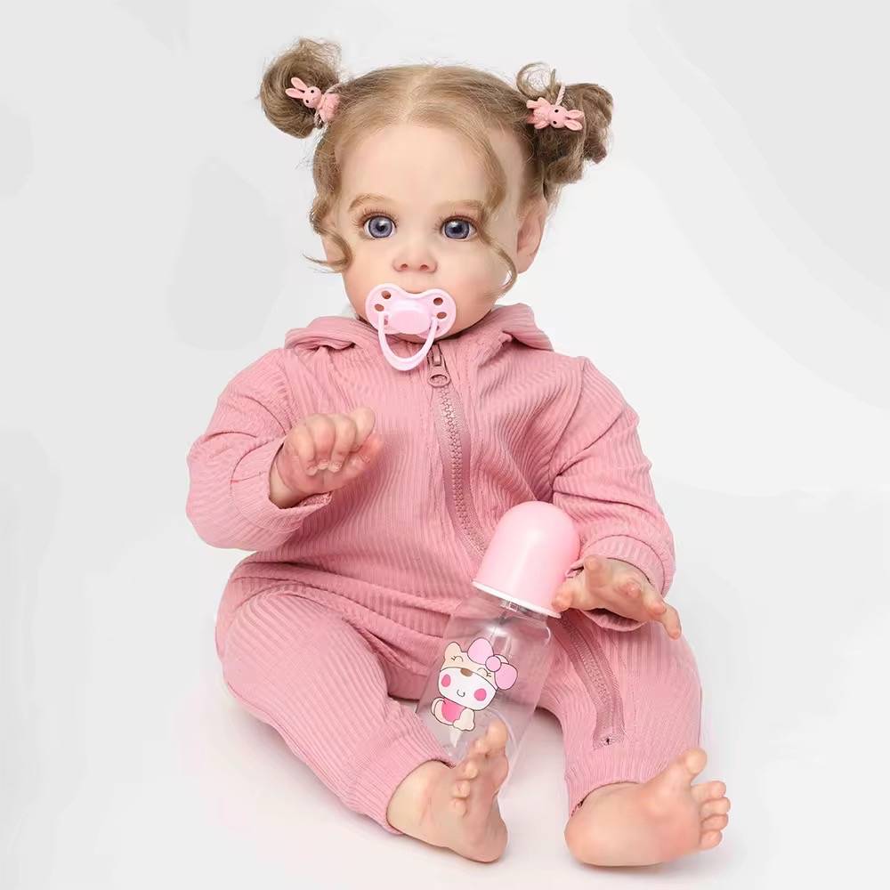 Muñeca reborn con chupete rosa